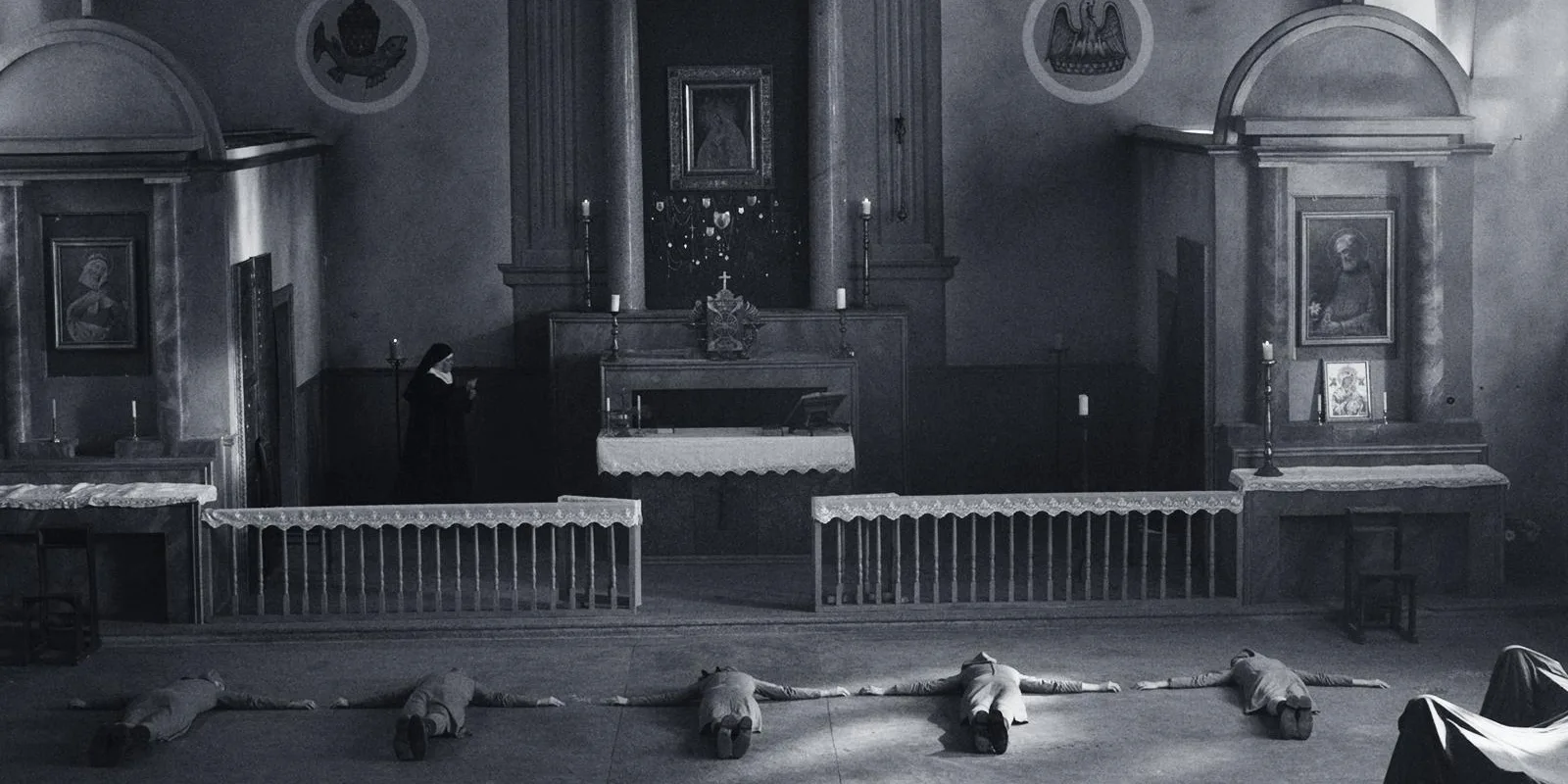Ida — nuns lying prostrate on the floor of a convent chapel